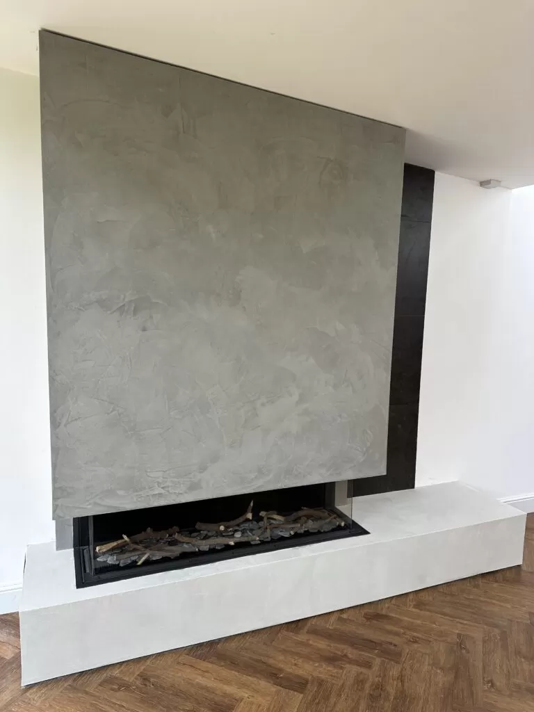 L&ograve; sưởi ho&agrave;n thiện Marmorino Stucco trong nội thất