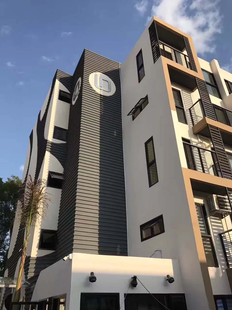 Thi c&ocirc;ng sơn đ&aacute; ngoại thất Durastone cho mặt tiền chung cư cao cấp